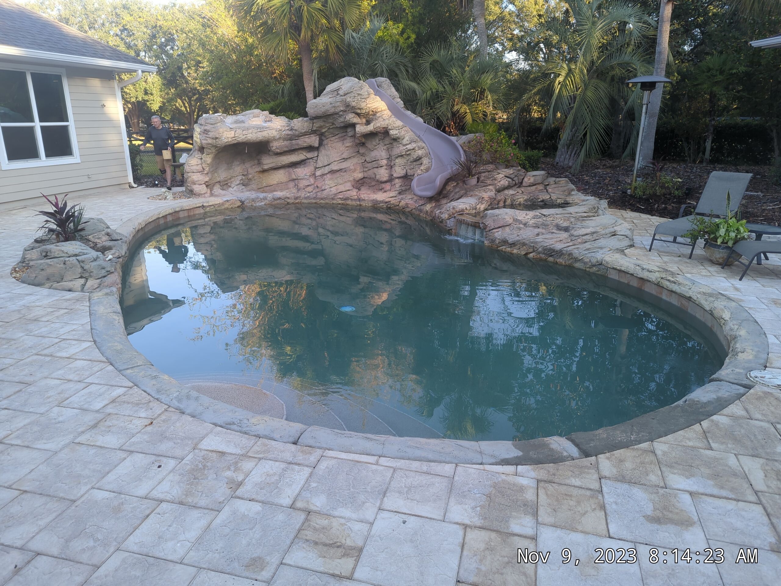 Leaking Gunite Swimming Pool with Grotto, Water Slide and Waterfall