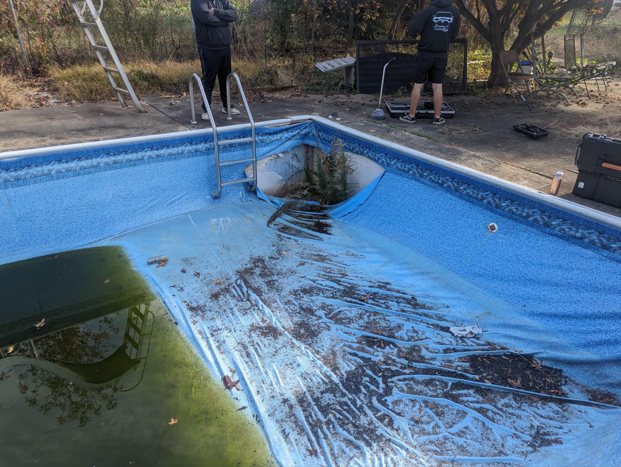 Neglected vinyl liner with large tear that requires liner to be replaced for proper pool leak repair